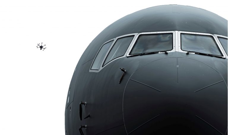 Big plane, small drone